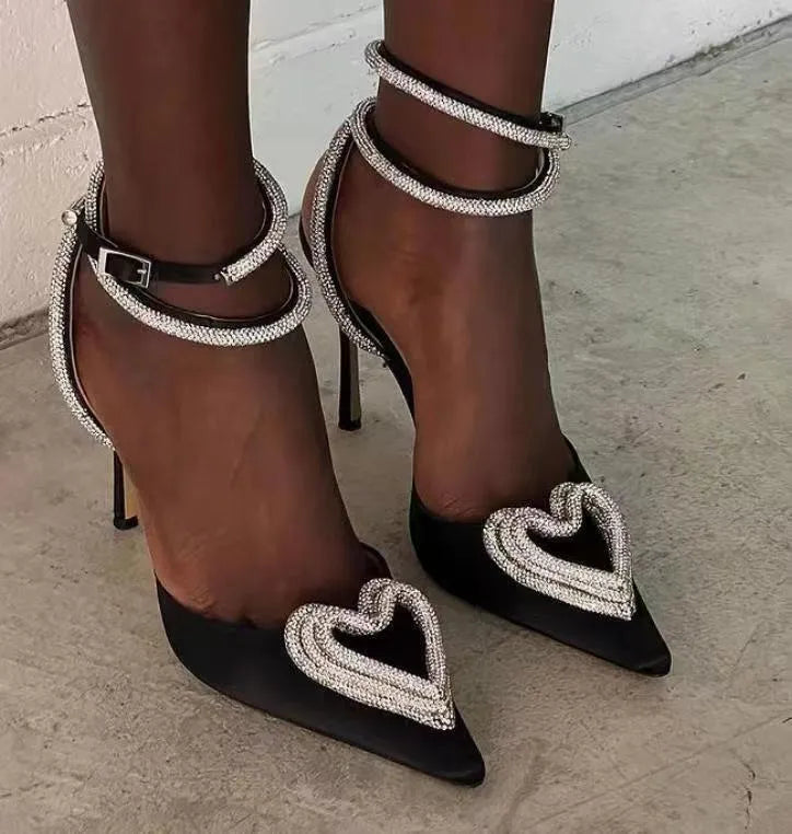 Women's pointed-toe sandals with heart rhinestone detail on satin upper in black, pink, or white colours