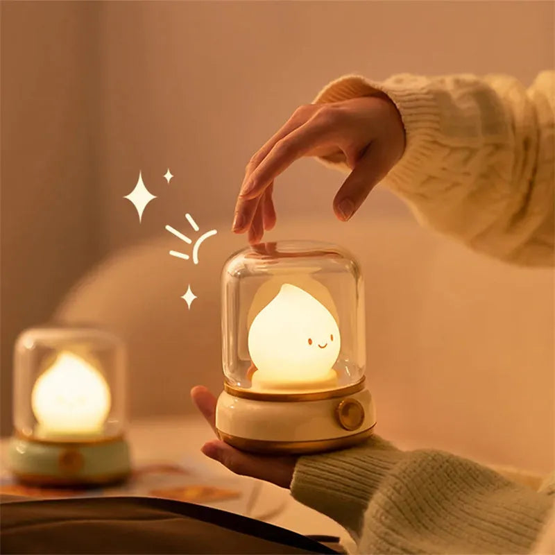 Retro oil lamp style USB rechargeable LED table lamp with dimmable lighting on wooden table