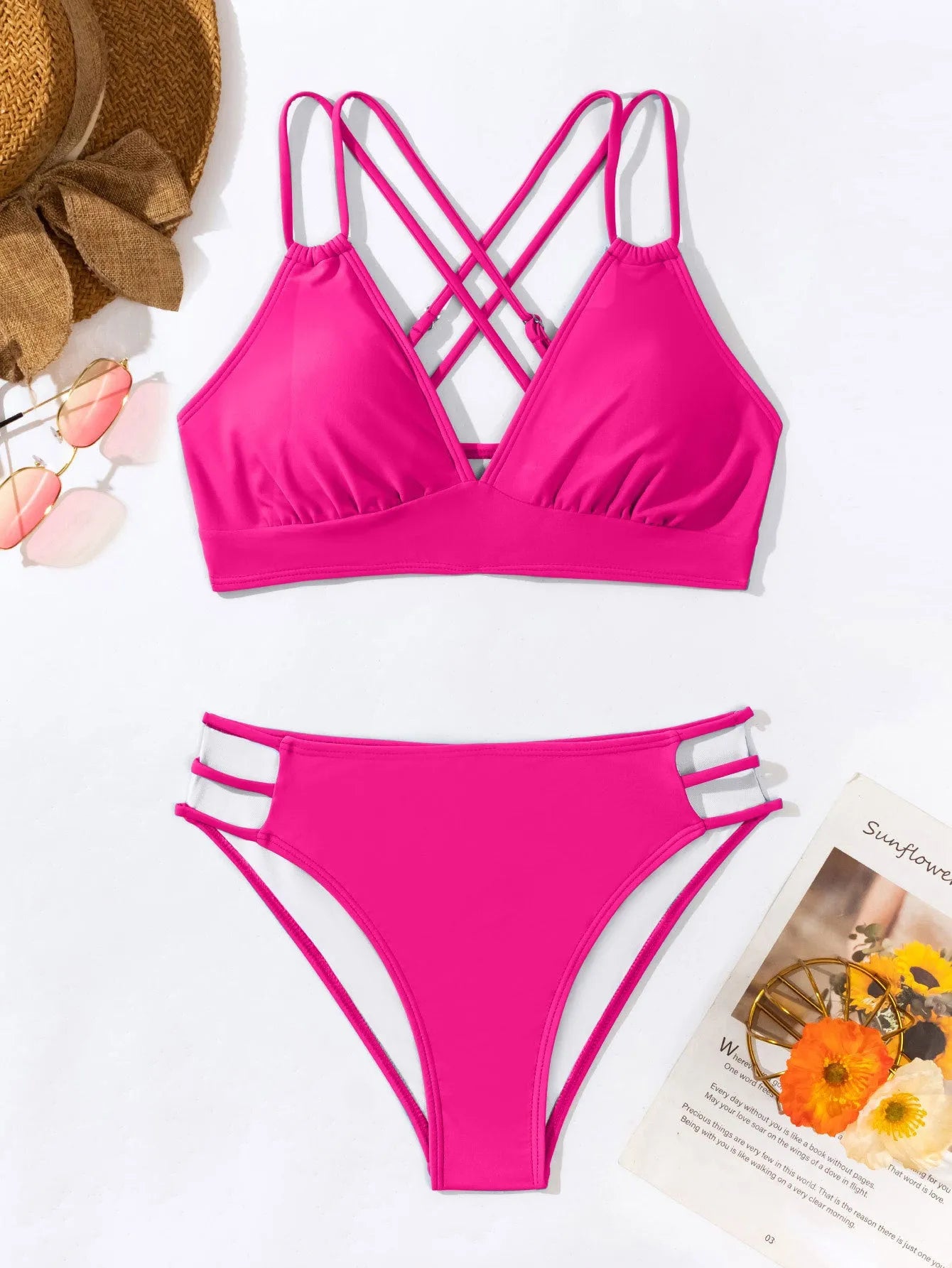 Women's black V-neck halter bikini swimsuit with bra and shorts on a mannequin