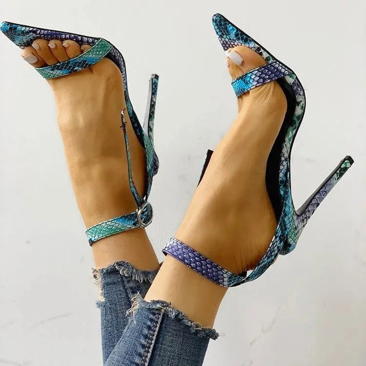 Serpentine large size heeled shoes with buckle closure and hollow-out design on pointed toe