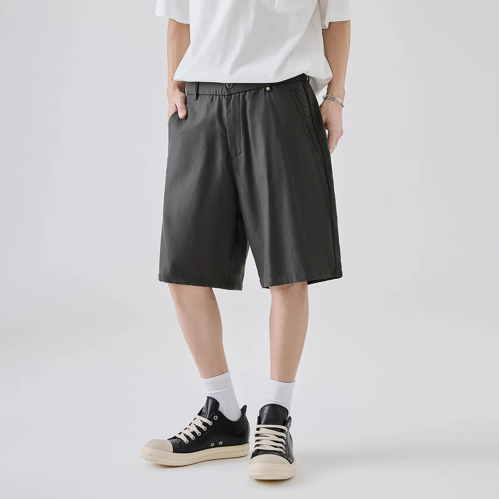 Men's apricot loose-fit Lyocell casual shorts on a plain background