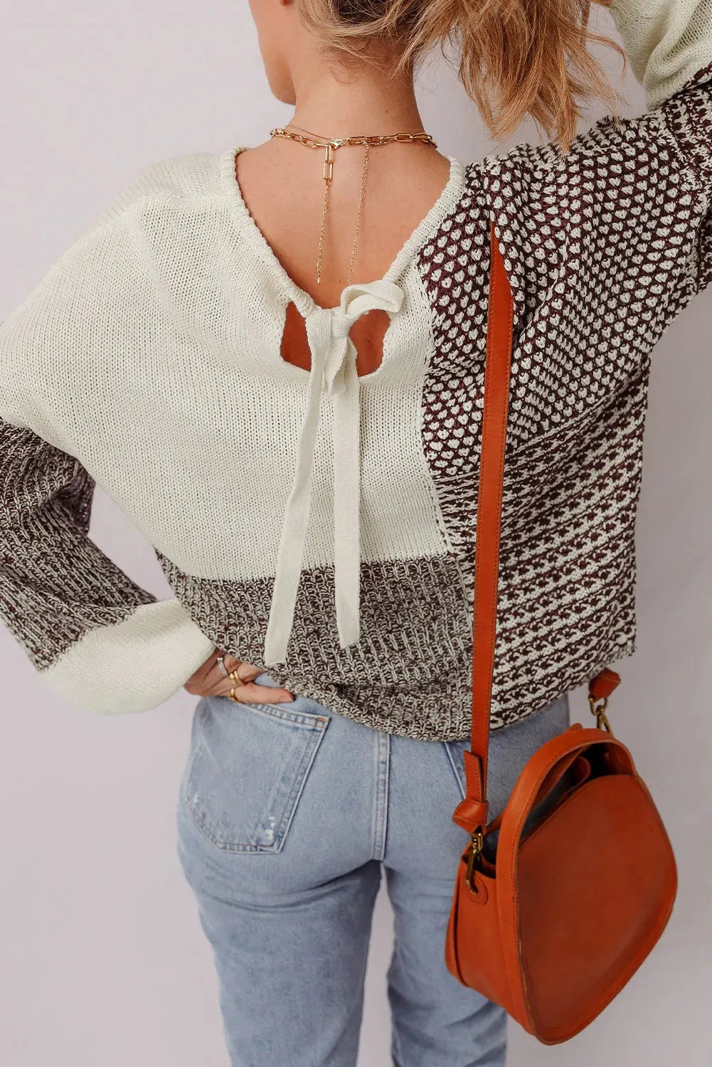 Dark khaki colour block loose sweater with a back tie and drop shoulder sleeves.