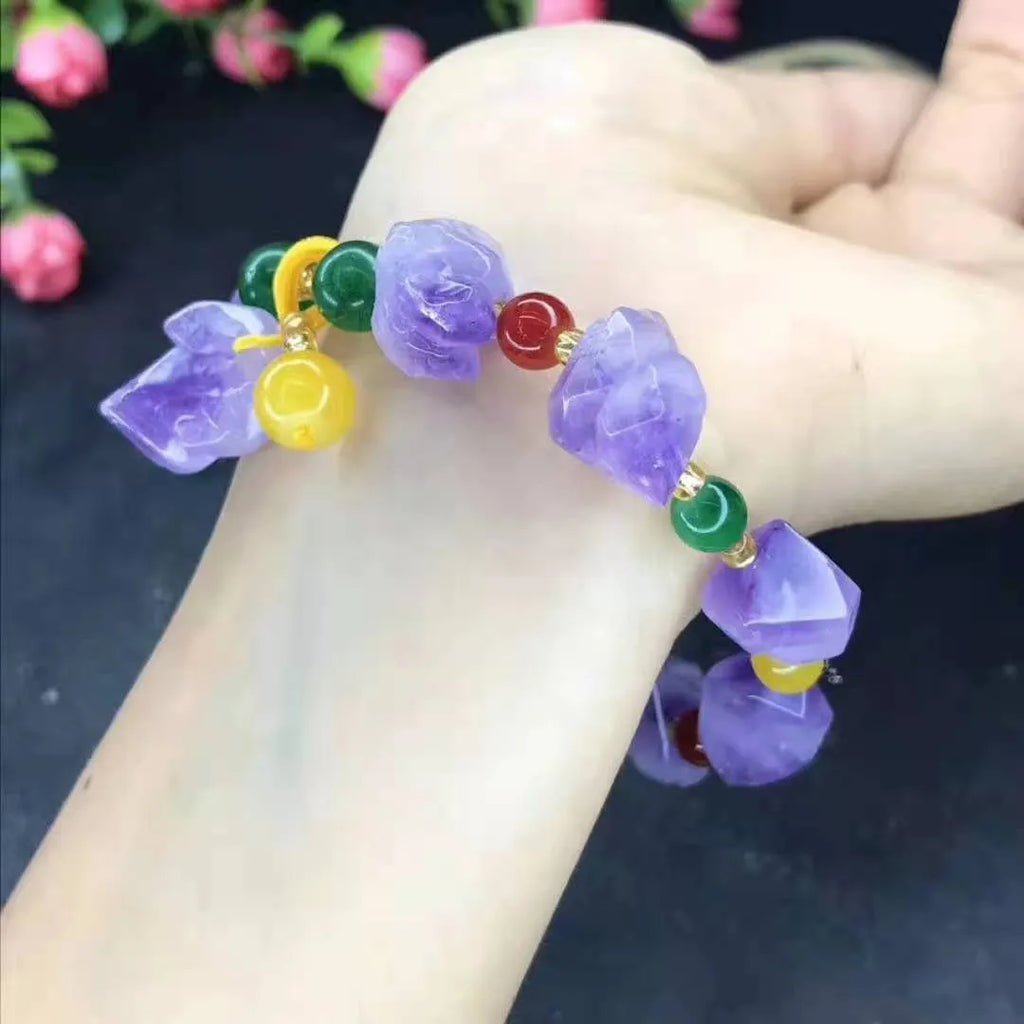 Natural style amethyst bead bracelet for women with a fu character charm.