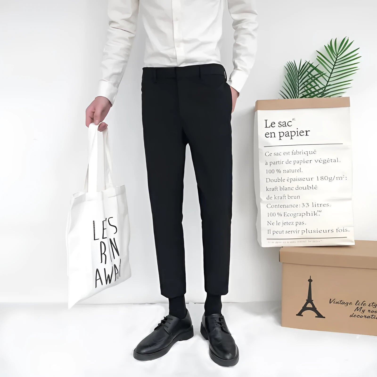 Men's straight-leg cotton trousers with drawstring waist in black, grey, and khaki colours