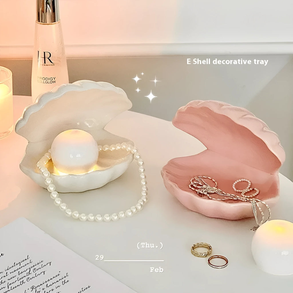 Yellow porcelain tray with a choice of pink or white decorative shell, some versions include a small integrated night light.