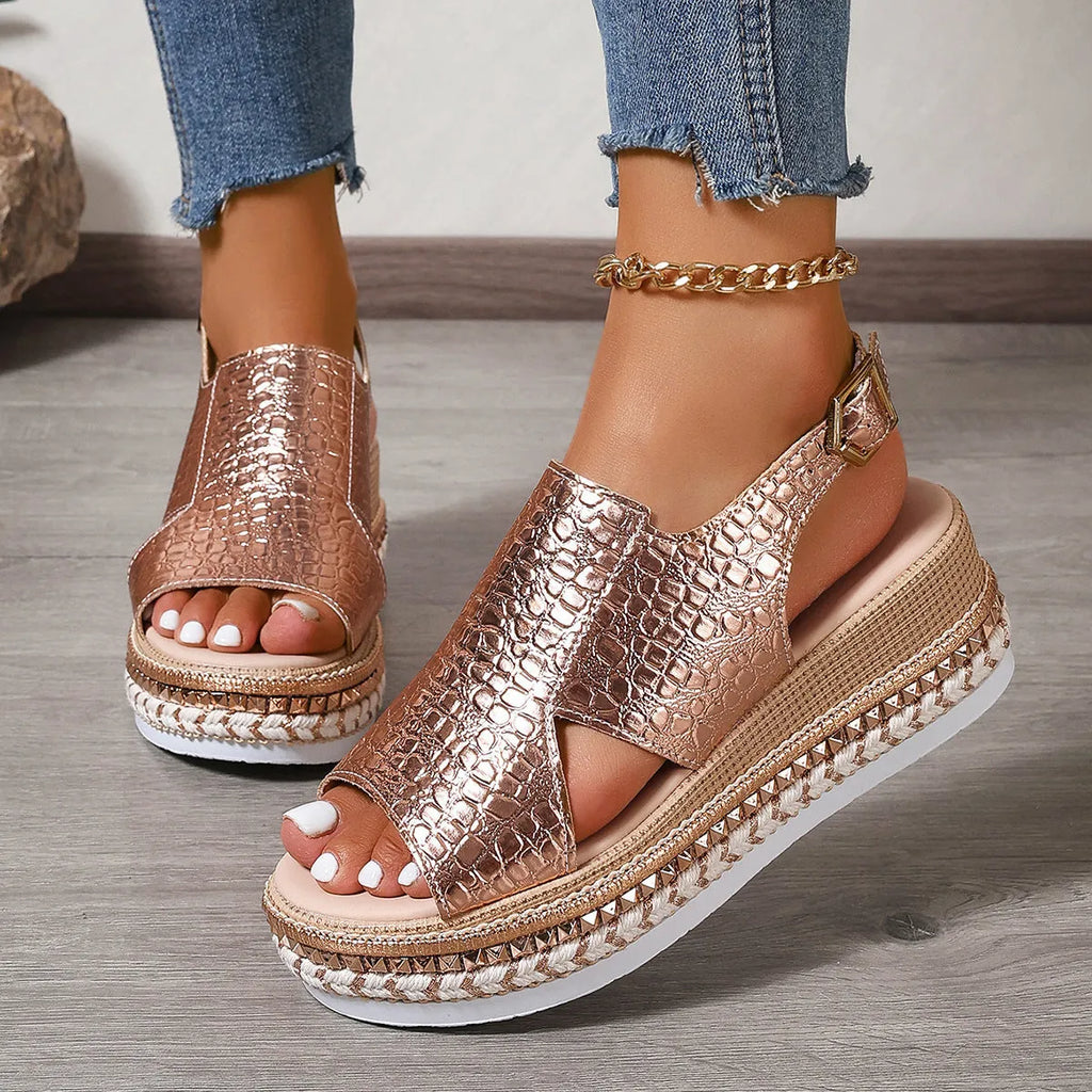 Gold Roman sandals with round toe, hollow-out pattern and adjustable ankle buckle