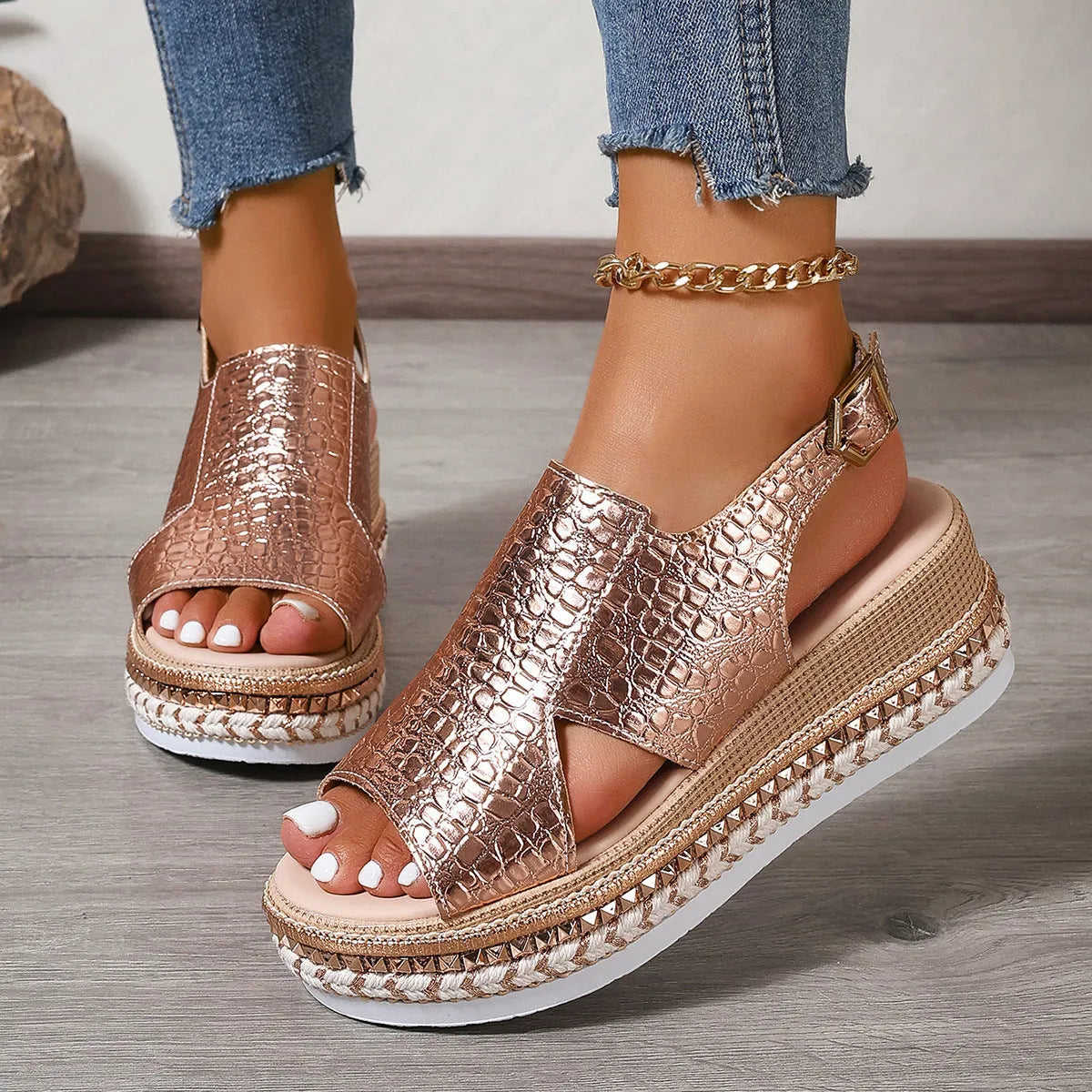 Gold Roman sandals with round toe, hollow-out pattern and adjustable ankle buckle