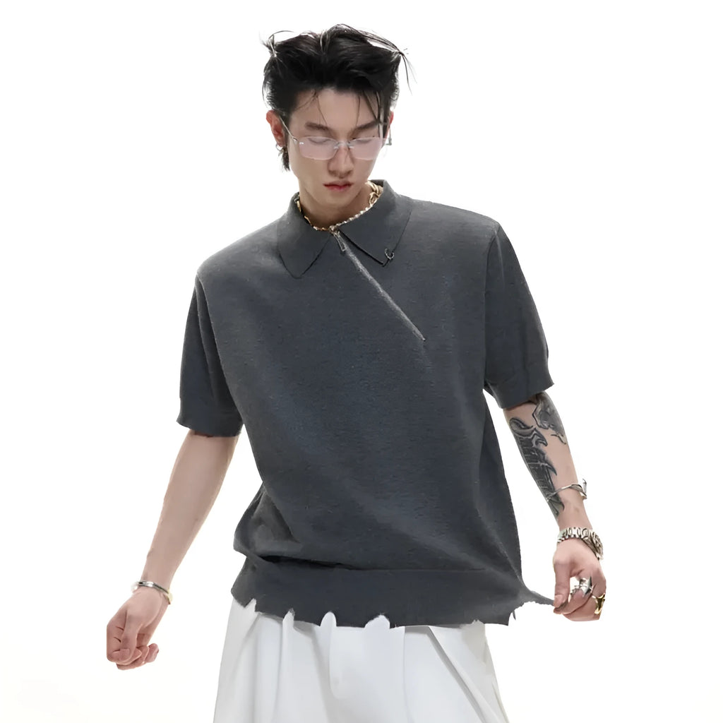 Men's slim-fit black knitted polo shirt with an oblique diagonal zip and short sleeves.