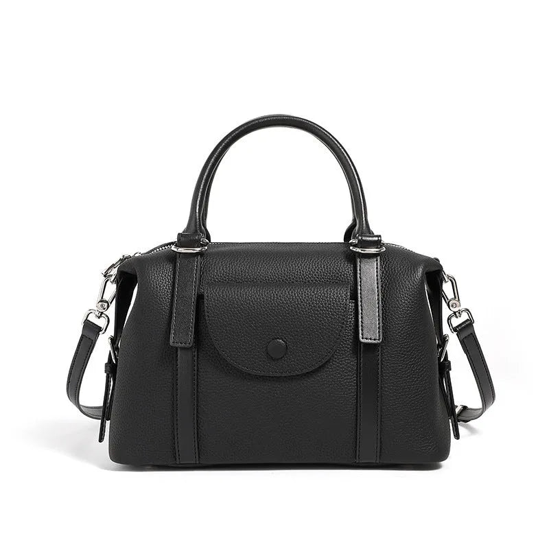 Genuine leather ladies' handbag in three colours with shoulder strap and lock fastener