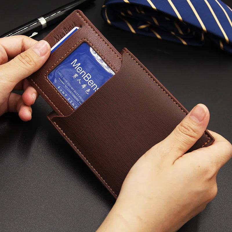 Men's black PU leather short wallet showing iron-edge card-picking slots and phone compartment.