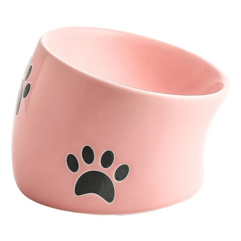 Ceramic cat food bowl with high foot design and cat's paw pattern in choice of colours