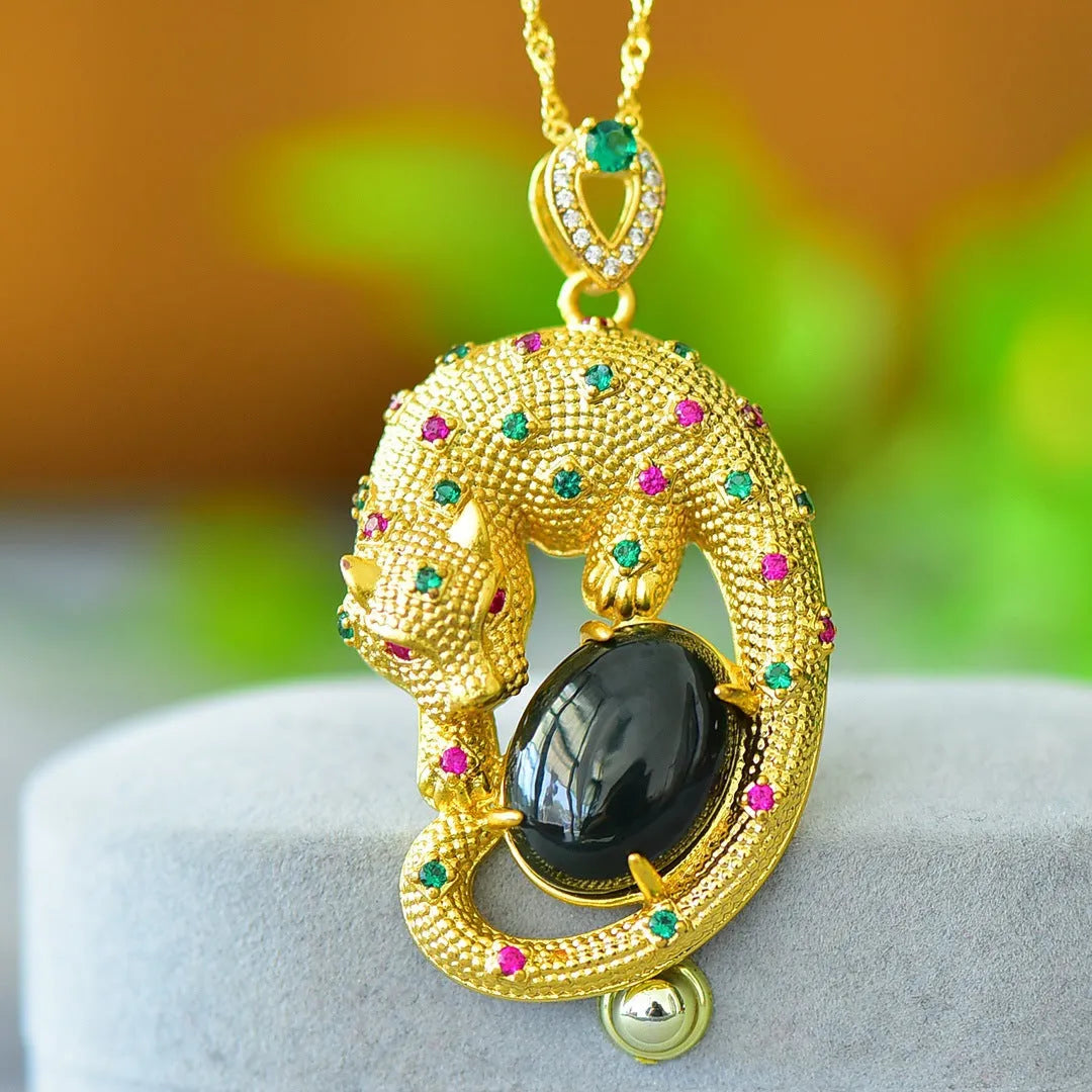 Natural Hetian jade flat pendant with copper inlay showing grey and ink blue stone variations on necklace