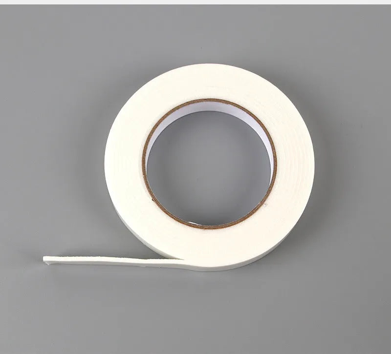 Roll of white foam double-sided adhesive tape showing its thickness, with size options 15mm, 18mm, and 30mm wide.