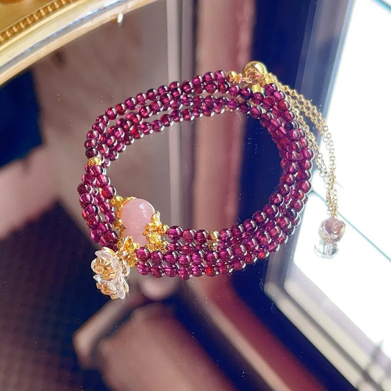 Women's natural garnet bracelet with double ring design and H311 colour garnet
