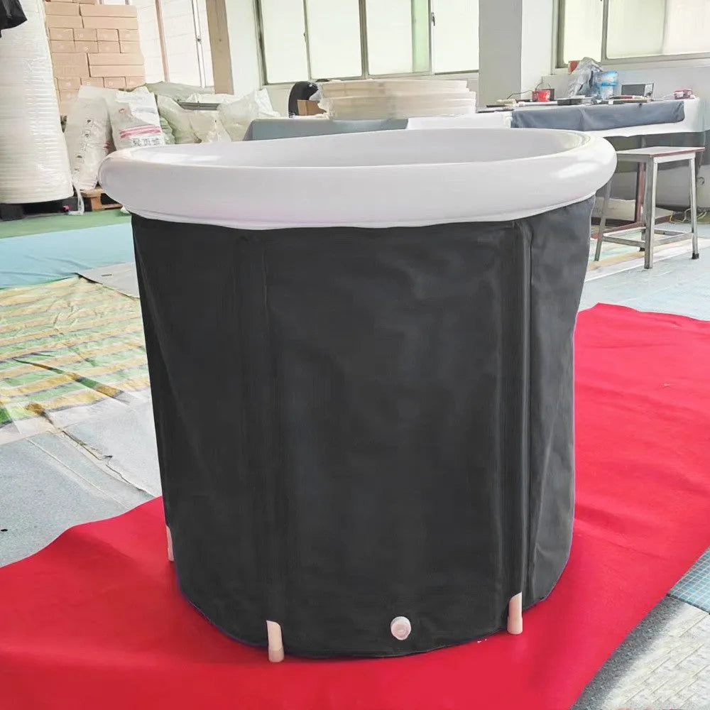 Black portable PVC ice bath with all-weather lid and included air pump accessories