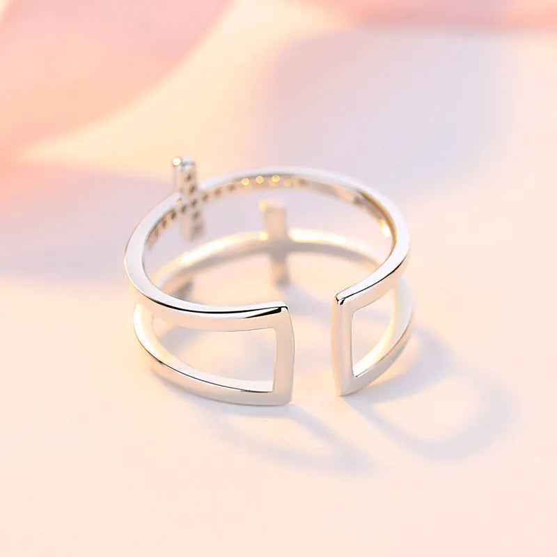 Women's adjustable double cross ring with copper base, sterling silver zircon inlay, and white gold electroplating