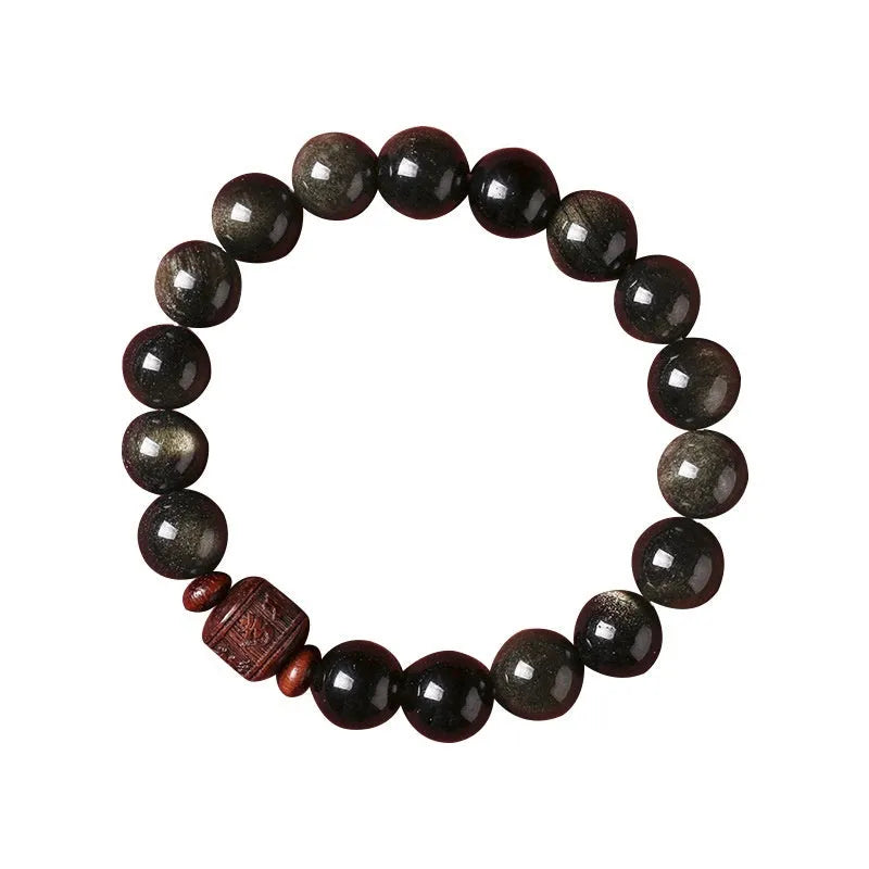 Golden obsidian vintage bracelet with hand-woven construction and national style design elements