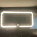 White car sun visor LED make-up mirror with aluminium lens mounted on vehicle visor