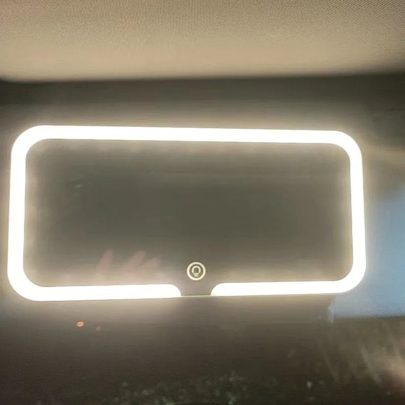 White car sun visor LED make-up mirror with aluminium lens mounted on vehicle visor