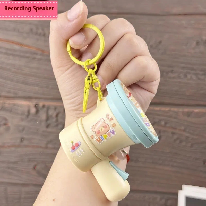 Cartoon recording small horn keychain toy ornament in green and yellow colours