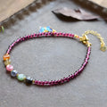 Purple garnet stone women's anklet with ethnic geometric design on ankle