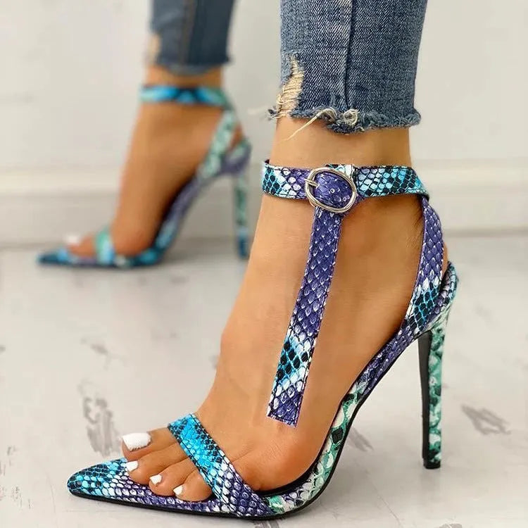 Serpentine large size heeled shoes with buckle closure and hollow-out design on pointed toe