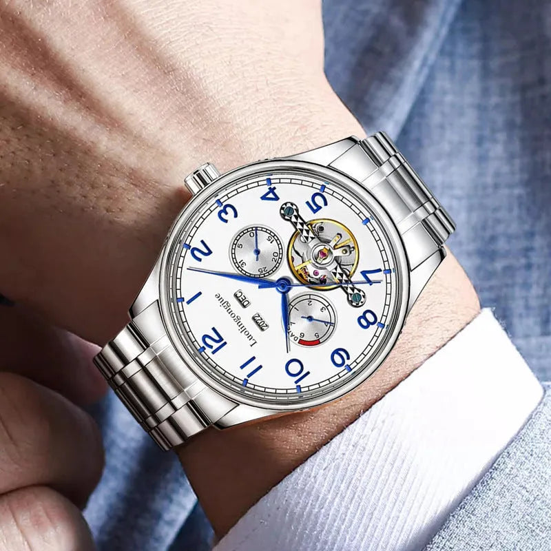 Men's stainless steel mechanical watch with hollow dial and leather strap.