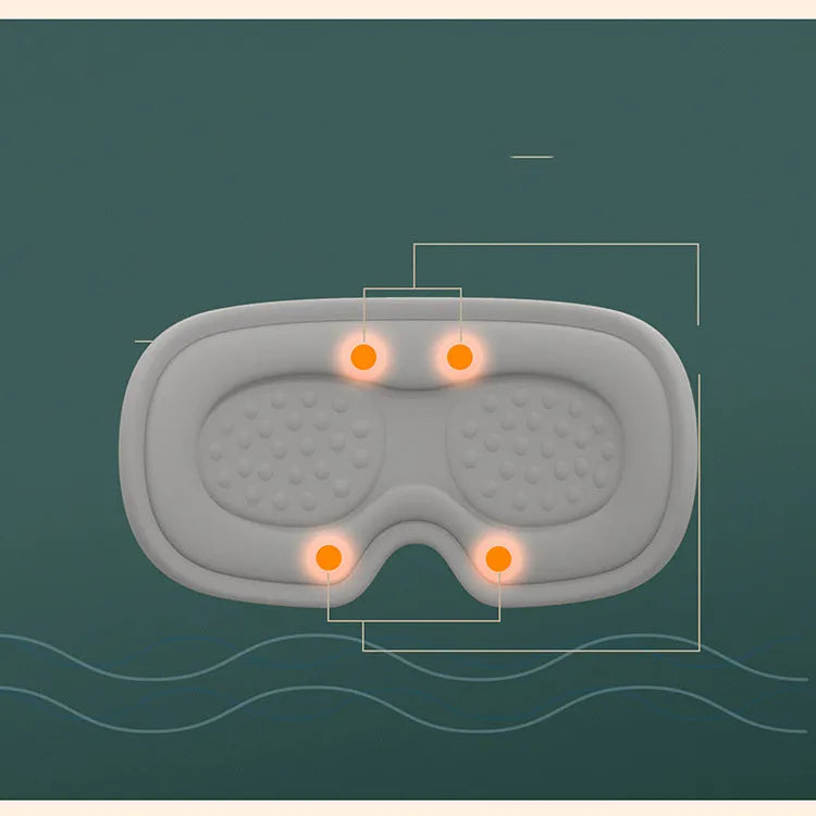 Pink portable eye SPA mask with suede shell on a grey background, showing USB port.
