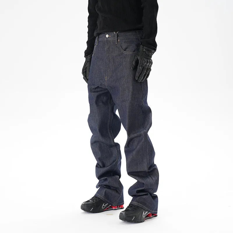A pair of dark blue casual loose straight-cut jeans on a plain background.