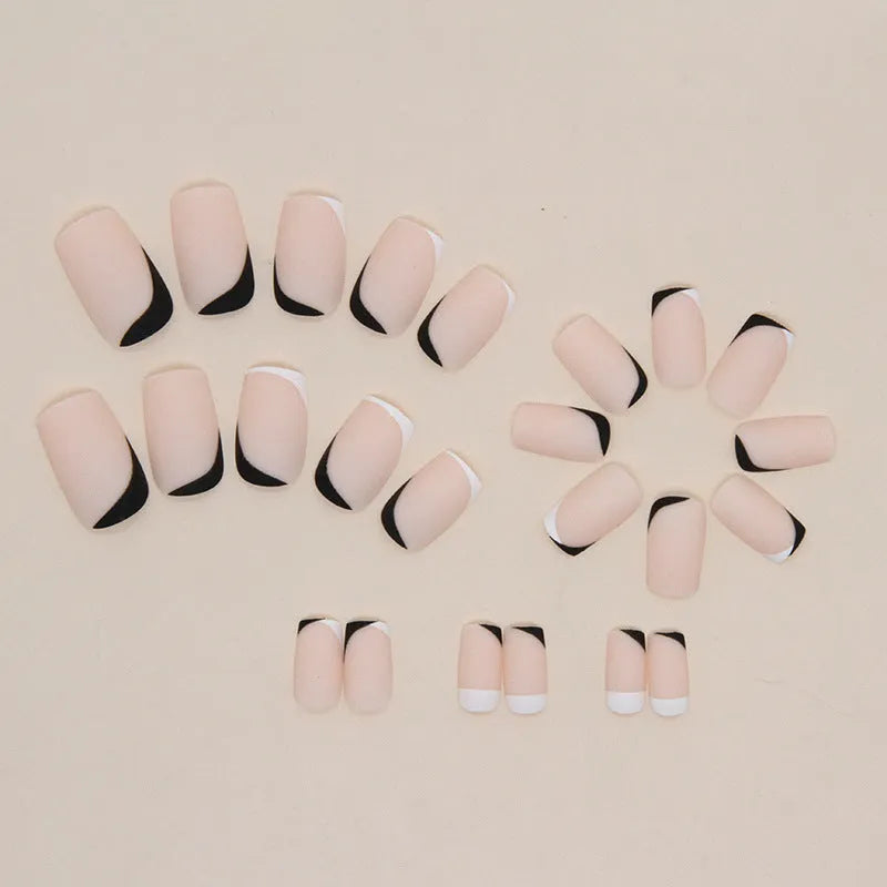 Black and white frosted gel nails with French tips and mandarin duck colour design