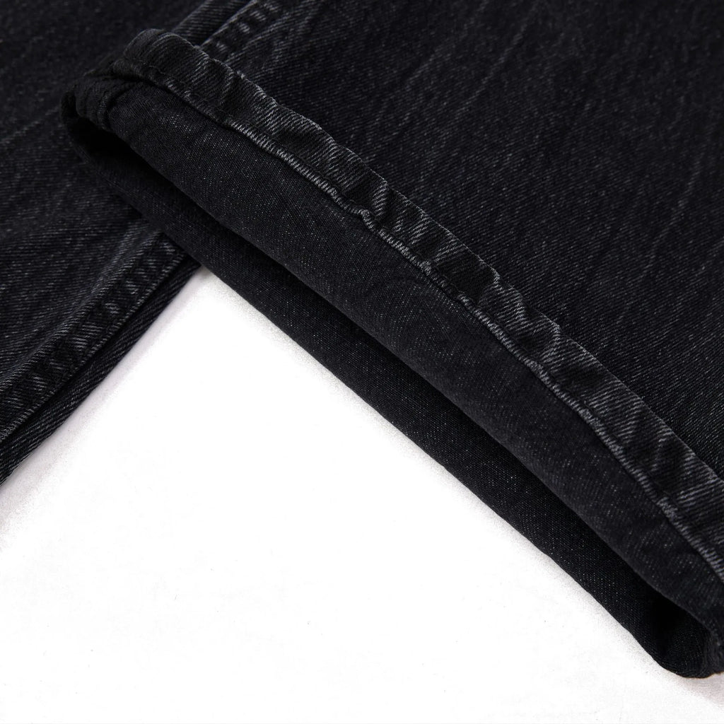 Black straight-leg men's jeans with American washed lightning crack texture detail