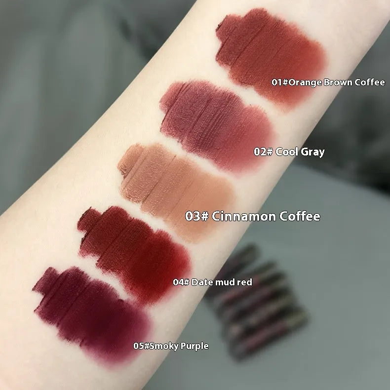 Lava Secret Matte Lip Mud Lipstick tube in shades orange brown coffee, cool grey, cinnamon coffee, jujube red, smoked purple.