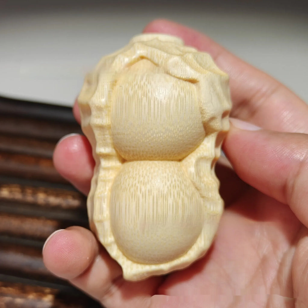 Solid bamboo carving peanut ornament with engraved good luck message for home decoration