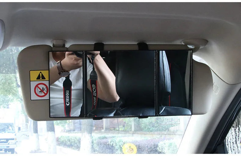 Silver car folding makeup mirror shown both closed and opened positions