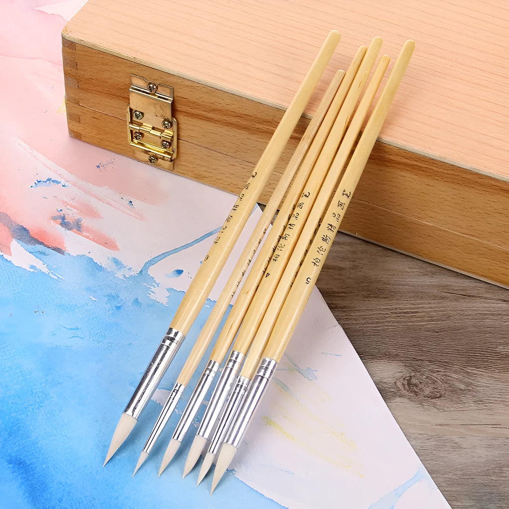 Set of six wooden-handled artistic brushes with pointed tips for calligraphy and watercolour painting.