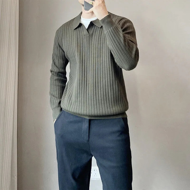 Men's loose grey knitted pullover sweater with a lapel collar on a hanger.
