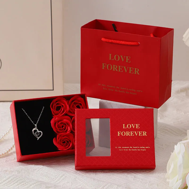 Korean style soap flower gift bouquet in presentation box with handbag in red, pink, or black.