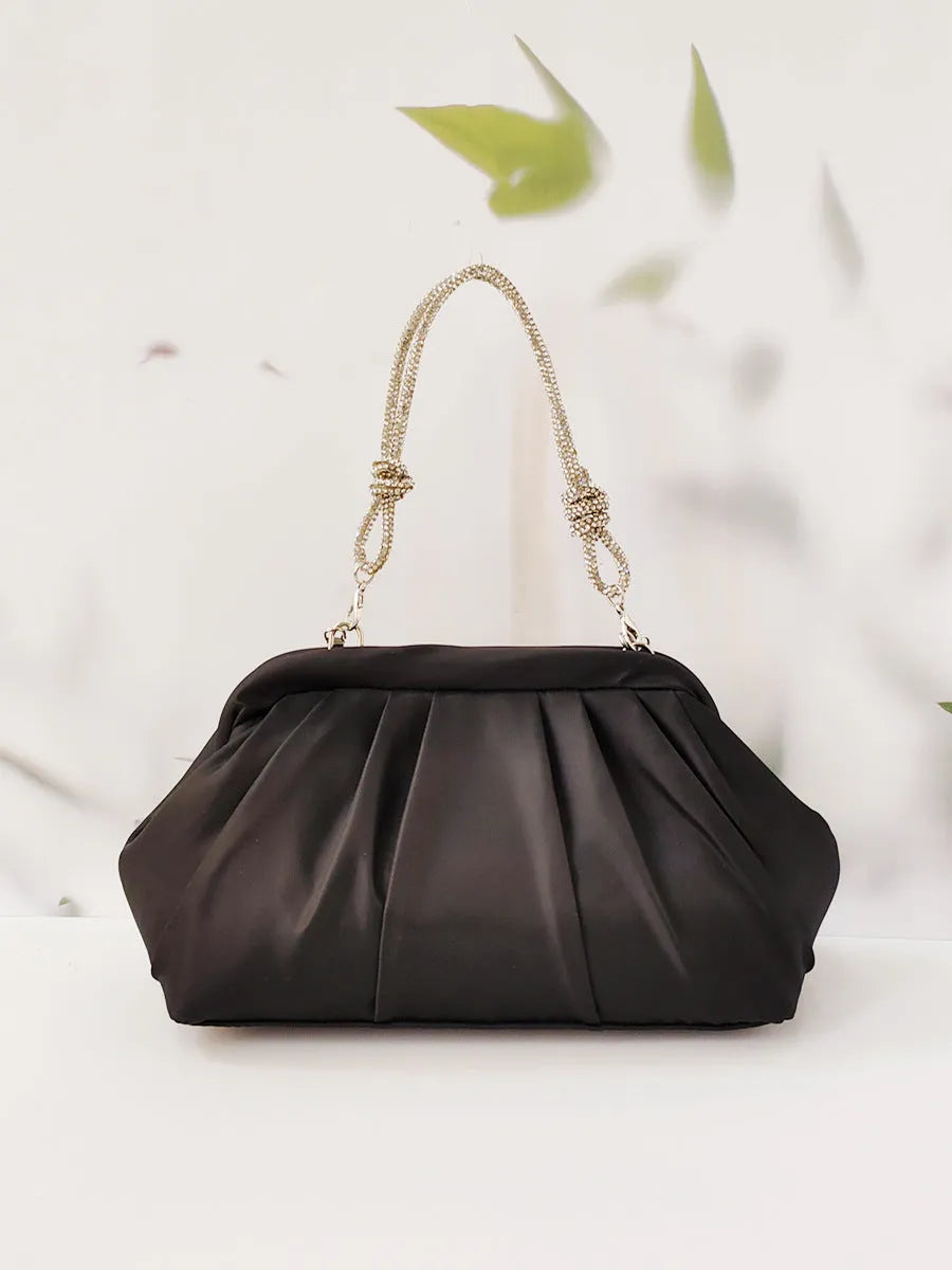 Women's soft polyester large-capacity dinner bag in shell shape with chain accents and diamond patterns.