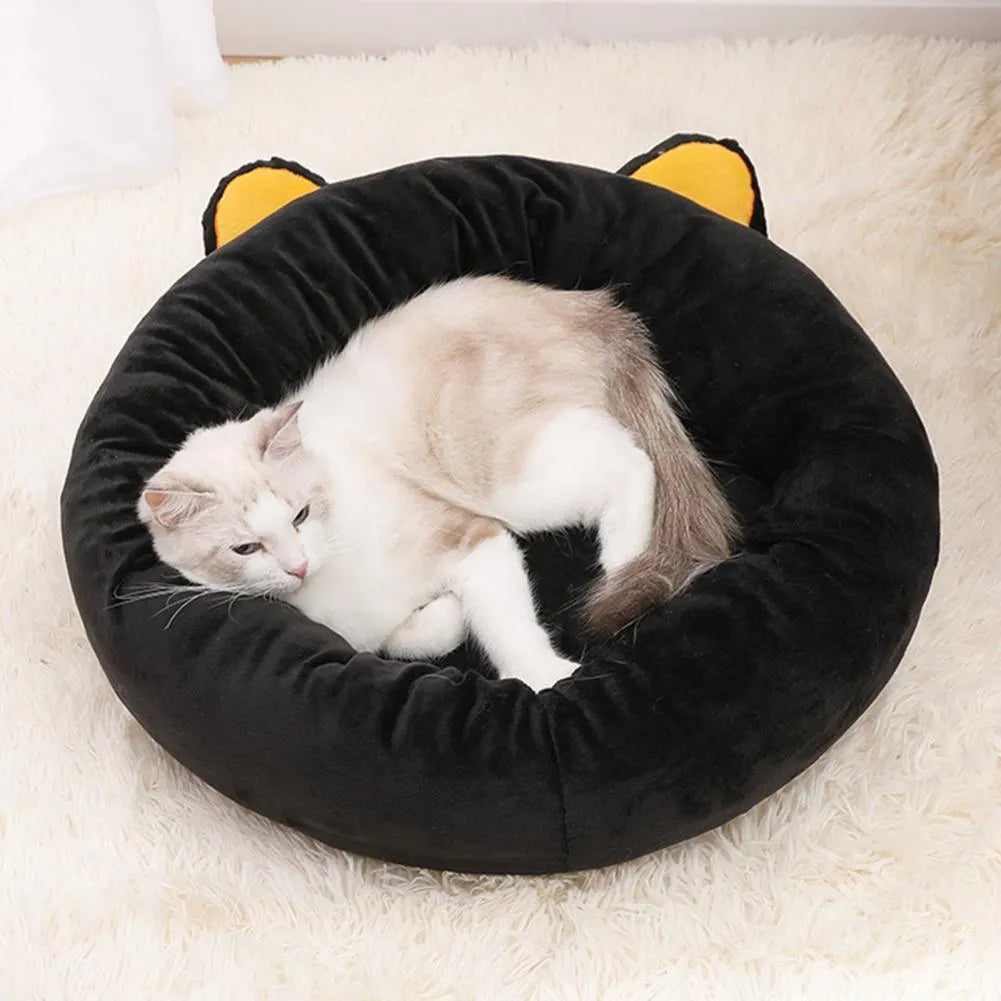 Black cat shaped velvet pet bed nest with raised edges for head support