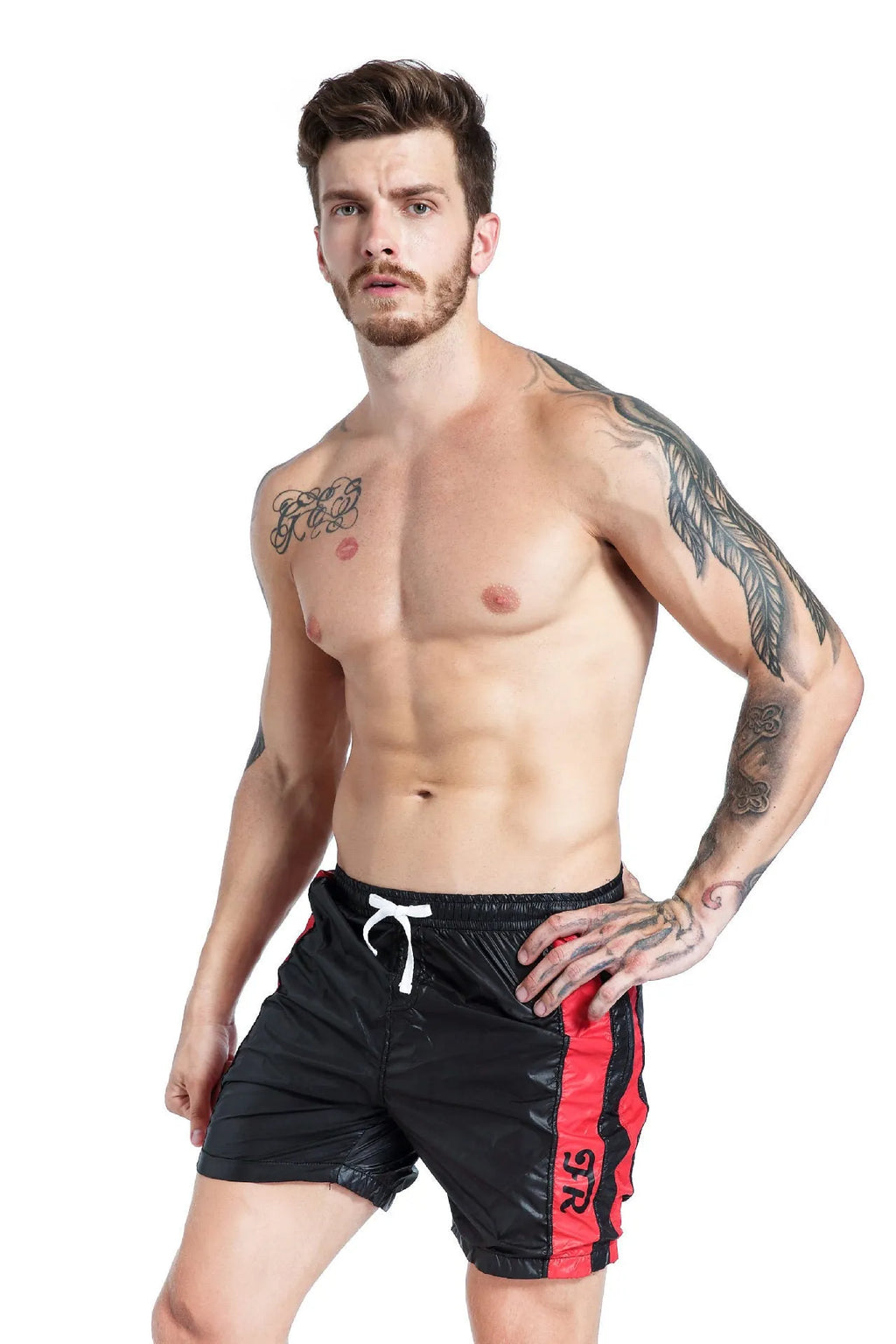 Man modelling blue casual sports shorts with lace-up front and slim fit.