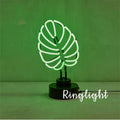 Handmade bamboo-shaped white and green USB desktop lamp in two sizes.