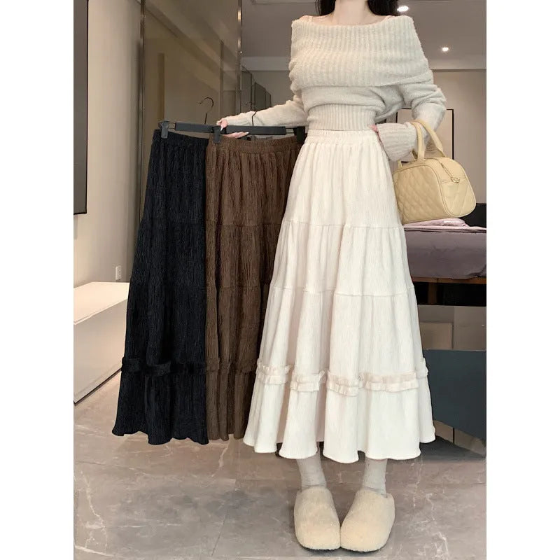 Corduroy A-line midi skirt with elastic waistband in milky white colour on hanger
