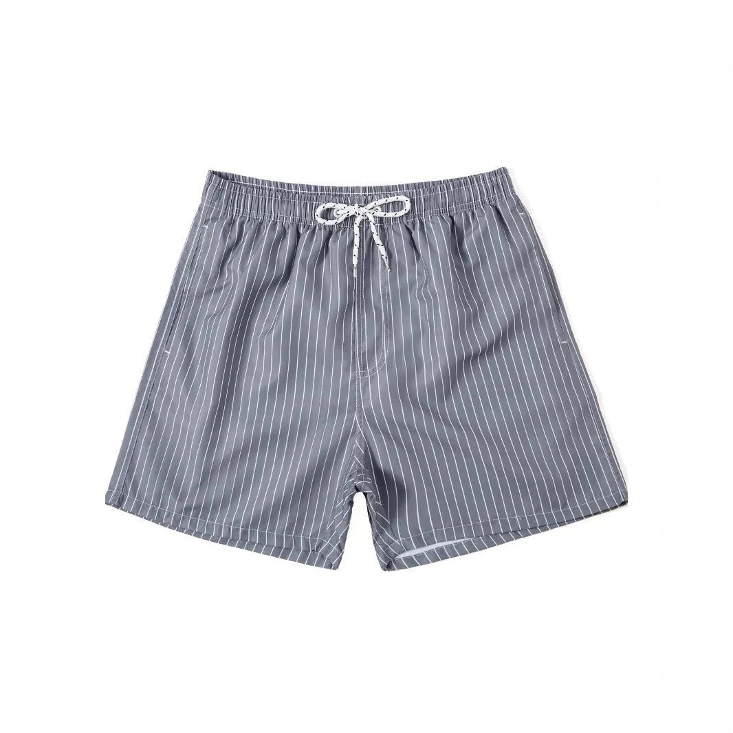 Men's striped polyester shorts in navy blue on a mannequin, showing straight leg design.