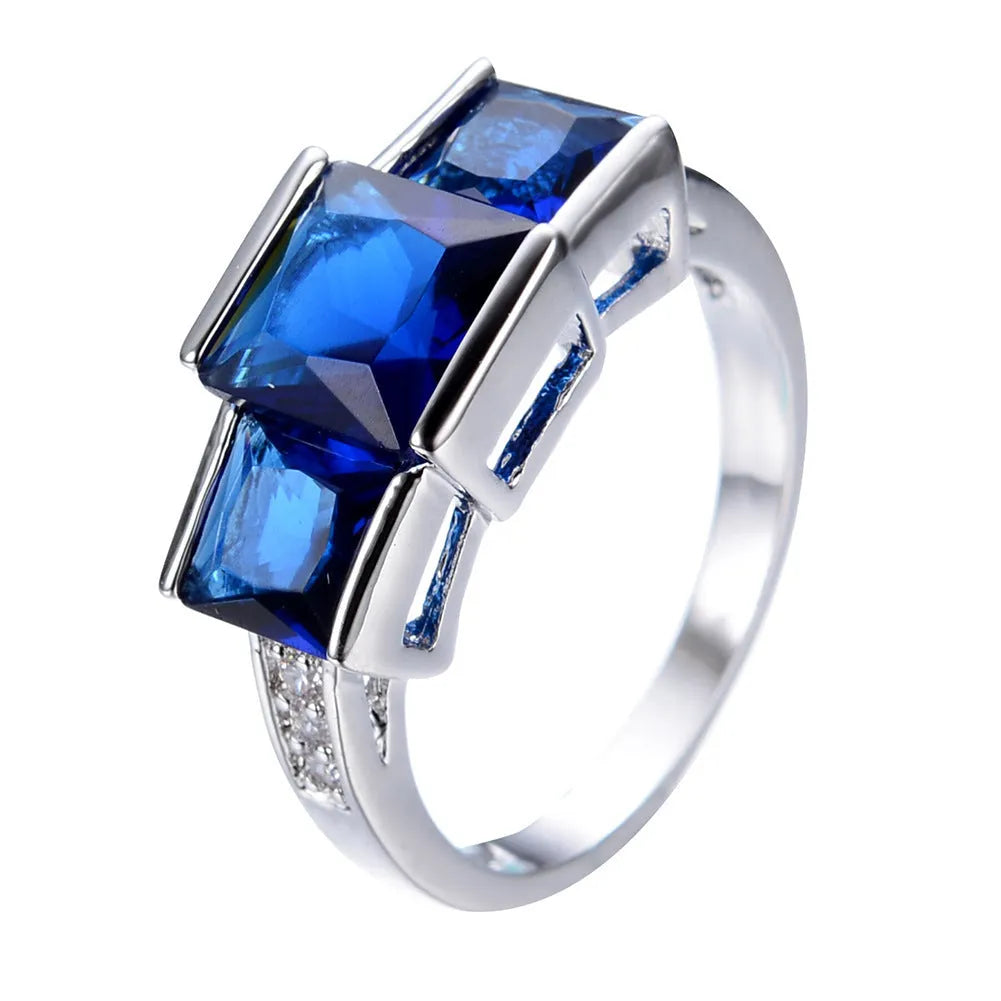 A colourful electroplated copper women's ring with a geometric design, shown in multiple colour options.