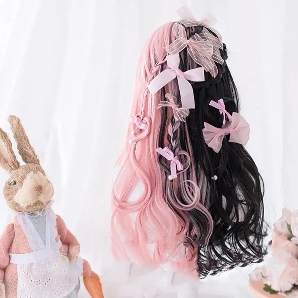 Long curly black and pink synthetic Lolita wig with bangs, styled for Harajuku cosplay.
