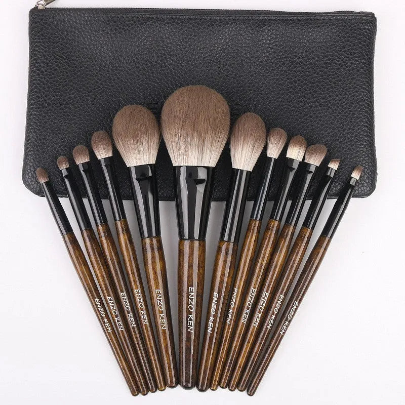 12-piece makeup brush set with wooden handles and a black PU storage pouch.