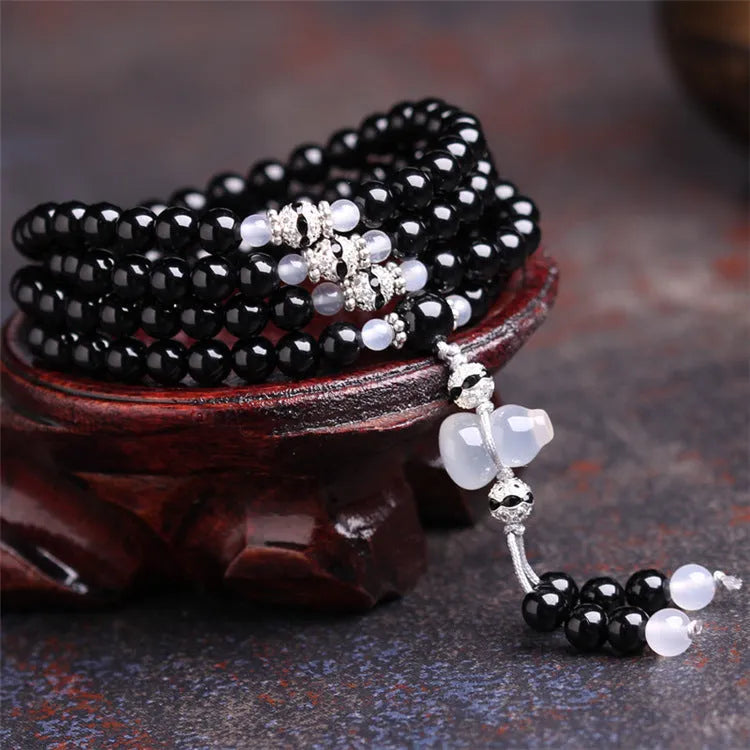Black agate stone bead bracelet with 108 geometrically shaped beads and number element details