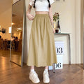 Camel-colour women's wide-leg skirt with elastic waist and quilted texture