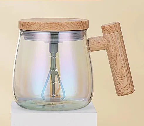 Clear borosilicate glass self-stirring coffee mug with electric base, 400ml capacity.
