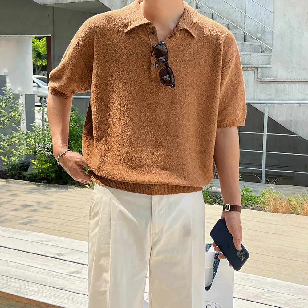 Retro-style men's caramel coloured knitted polo shirt with short sleeves and an asymmetric design detail.